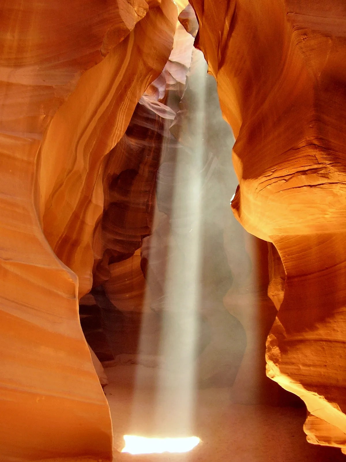 Sunlight revealing the flowing orange walls of Antelope Canyon